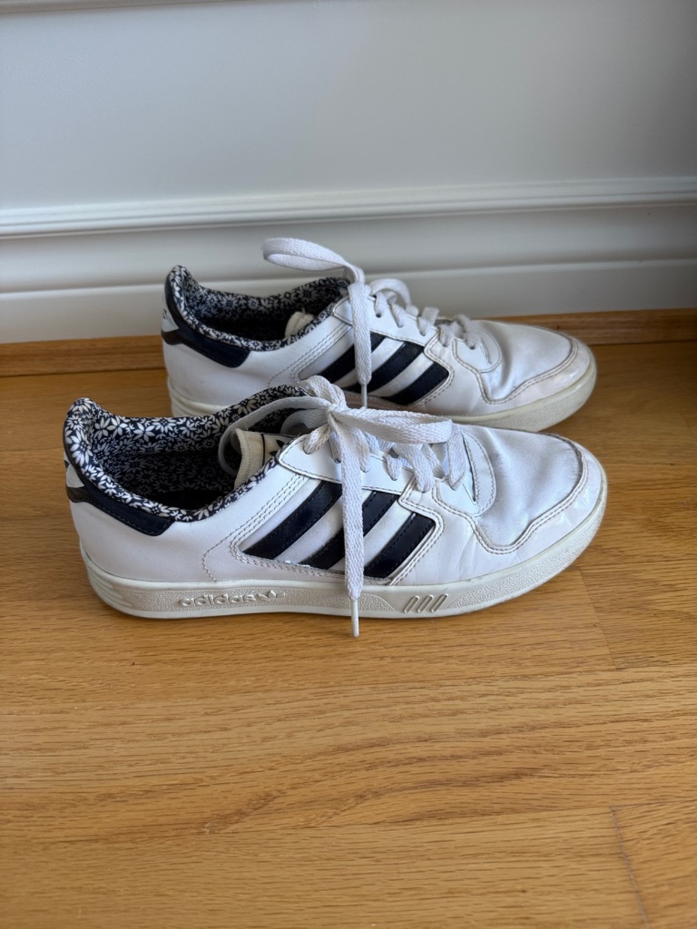 Adidas Vintage White Sneakers with Black Stripes